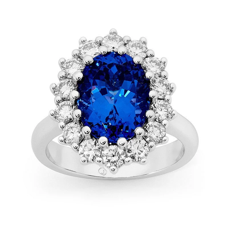 two-shade promise ring-Tanzanite Oval Shape with round brilliant cut diamonds halo dress ring