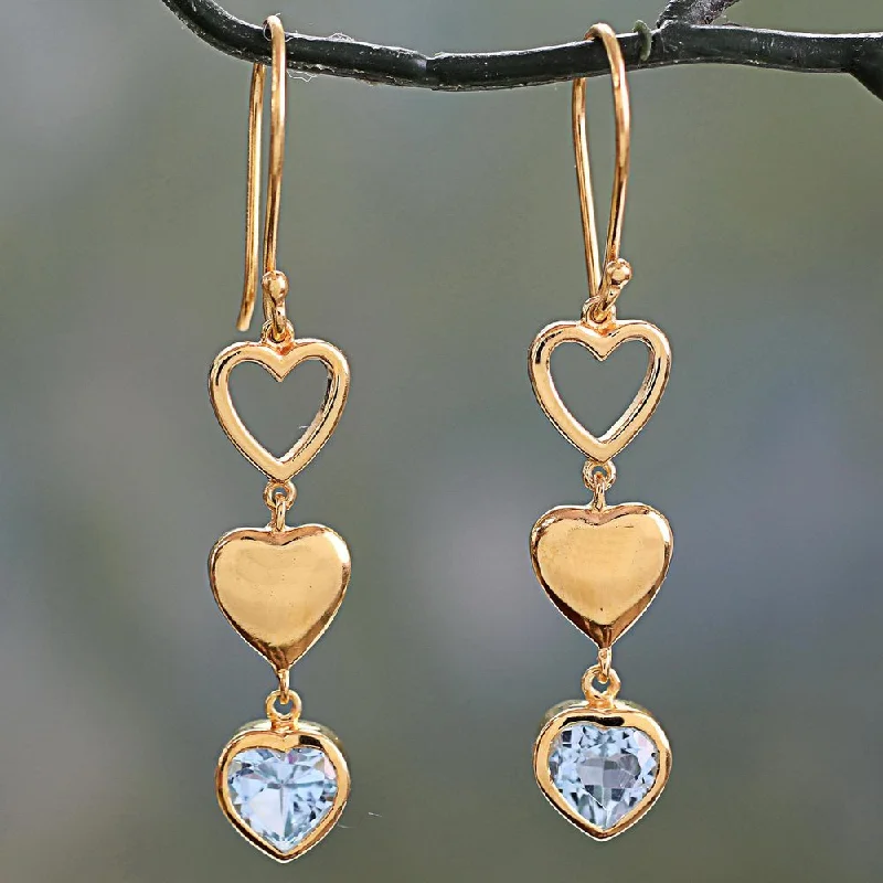 sprig hoop earrings-Handcrafted Gold Overlay 'Three Hearts in Harmony' Blue Topaz Earrings (India) - 2.2L*0.4W